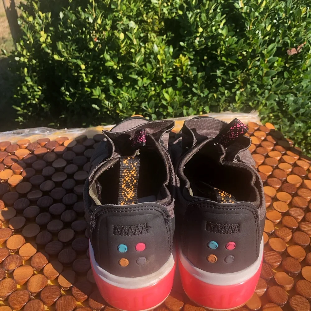 Nike Kids Gray Slip-On Sneakers with Pink Heel Accent